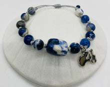 Load image into Gallery viewer, Leather Sliding Knot Bracelet Blue White Stone with Silver African Map Symbol
